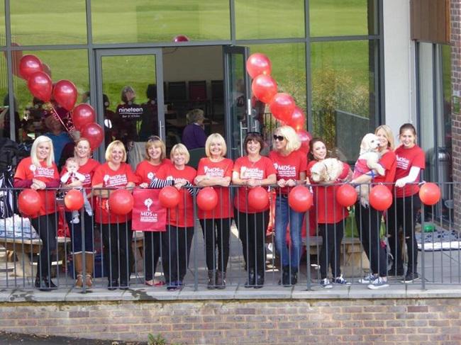 Alll the ladies in MDS T-shirts and with red balloons too